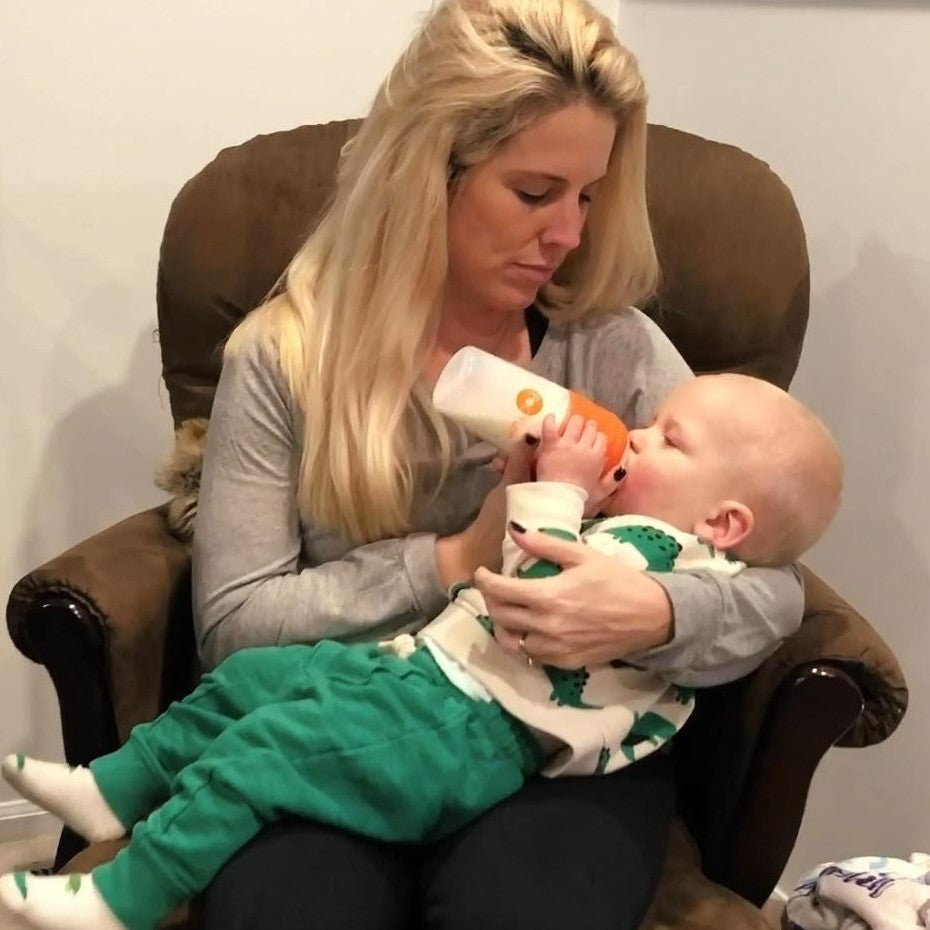 Mom Feeding Baby with PopYum Bottle